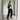 Salomon XT-6 Gore-Tex sneakers styled in a casual gorpcore mirror selfie outfit with hoodie, vest, and cargo pants