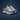 ASICS Gel-1130 grey navy and lime sneakers pair front angled view on dark blue studio background