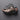 ASICS Gel-Nimbus 10.1 Black Rose Gold sneaker flat lay top view showing full silhouette and lace placement