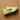 Nike Pegasus Premium Alabaster Volt running shoe angled view with cream upper and volt green sole